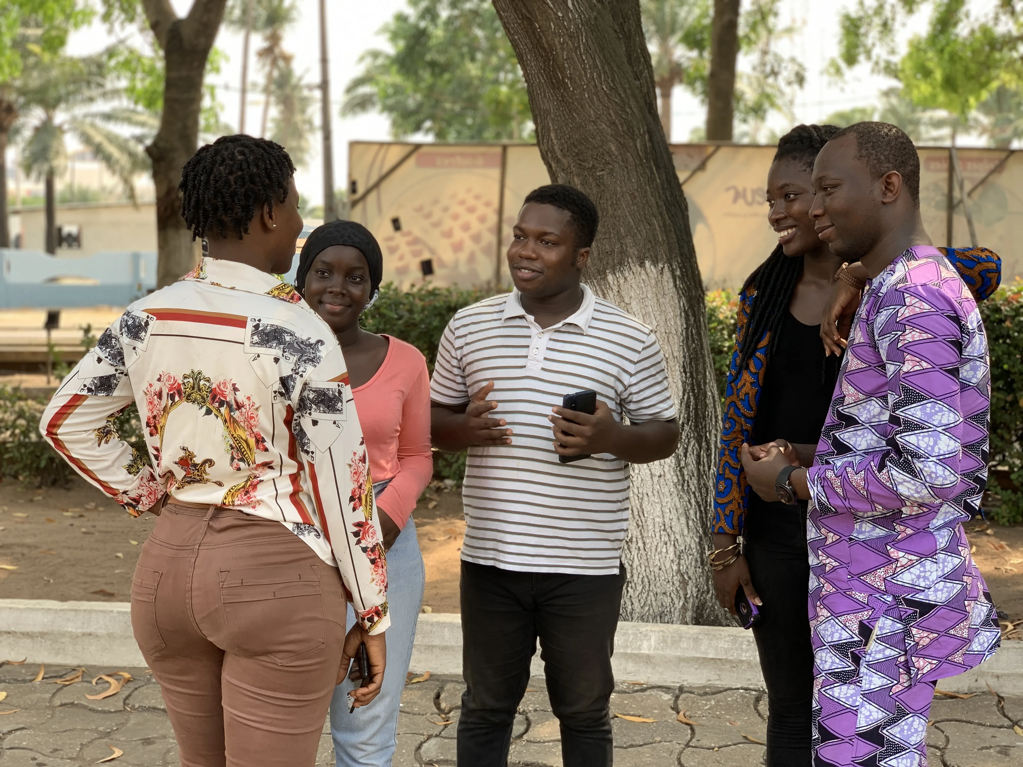 Group of people talking in a circle